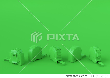 Set of monochrome carpenter measuring tape on multicolor background with units scale Set of monochrome carpenter measuring tape on multicolor background with units scale 112713330