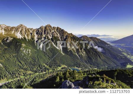 Mountain landscape of the Stubai Alps 112713703