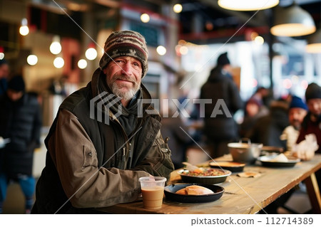 homeless eating free food 112714389
