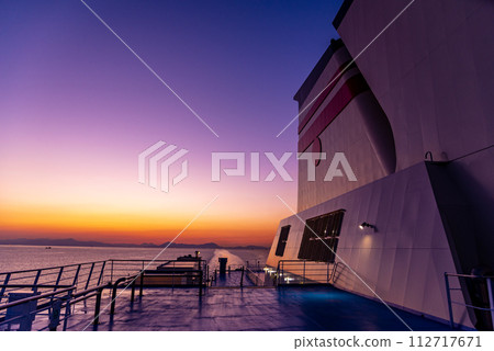 Sunset seen from the ferry deck 112717671