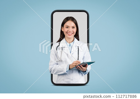 Female doctor with tablet in huge phone screen 112717886