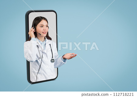 Female doctor in headset on phone screen consult, free space Female doctor in headset on phone screen consult, free space 112718221