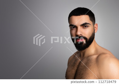 Confident hot middle eastern man posing topless Confident hot middle eastern man posing topless 112718479