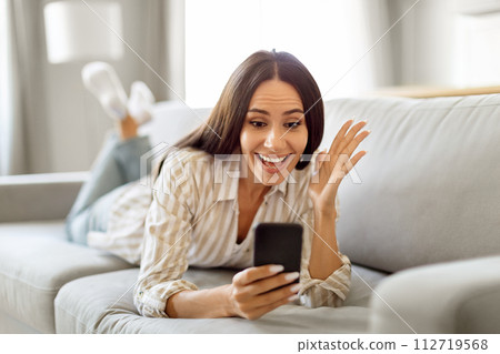 Good News. Overjoyed Female Looking At Smartphone Screen And Exclaiming With Excitement 112719568