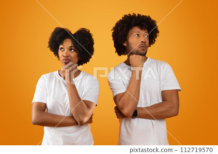 Pensive millennial african american man and woman thinking about something 112719570