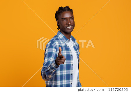 Handsome Young African American Guy Pointing At Camera With Hand, Saying Gotcha Handsome Young African American Guy Pointing At Camera With Hand, Saying Gotcha 112720293