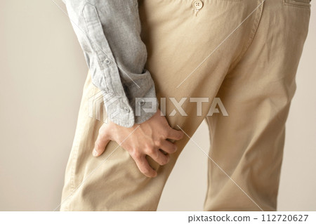 Man with muscle pain, cramps, body parts Man with muscle pain, cramps, body parts 112720627