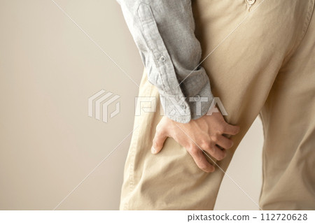 Man with muscle pain, cramps, body parts Man with muscle pain, cramps, body parts 112720628