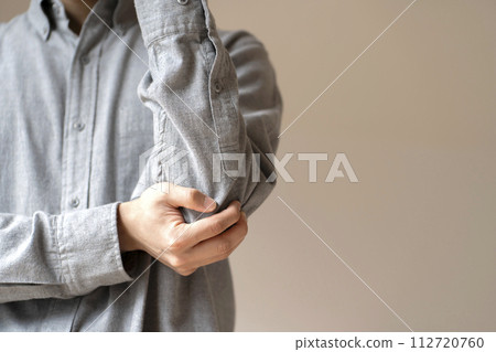 Man with elbow pain Elbow pain body parts 112720760