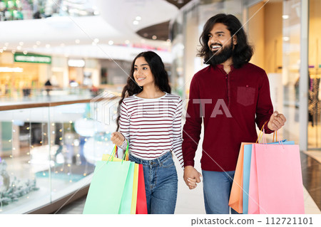 Happy Eastern Customers Enjoying Weekend In Mall Happy Eastern Customers Enjoying Weekend In Mall 112721101