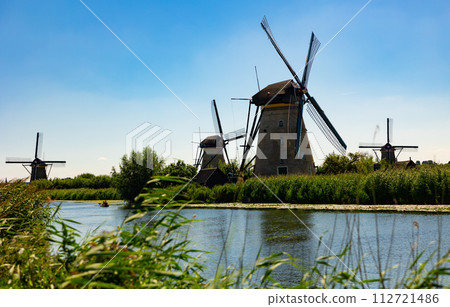 System of ancient windmills ar Kinderdijk, Netherlands 112721486