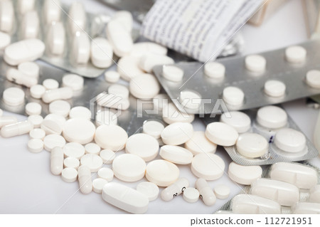 Different pills on white background 112721951