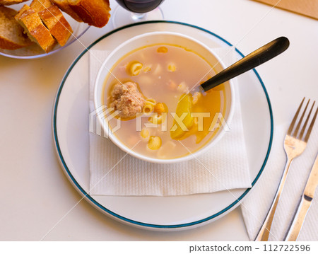 Catalan Christmas soup with meatballs, pasta and vegetables Catalan Christmas soup with meatballs, pasta and vegetables 112722596