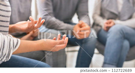 Emotional woman sharing her story during support session 112722689