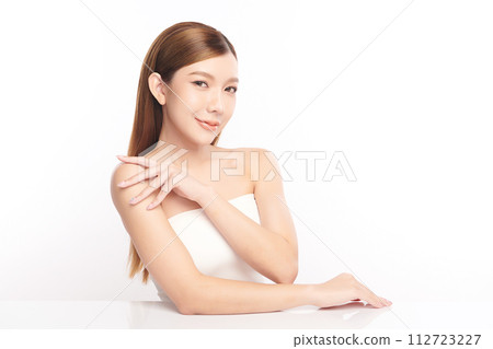 Beautiful young asian woman with clean fresh skin on white background, Face care, Facial treatment, Cosmetology, beauty and spa, Asian women portrait. Beautiful young asian woman with clean fresh skin on white background, Face care, Facial treatment, Cosmetology, beauty and spa, Asian women portrait. 112723227