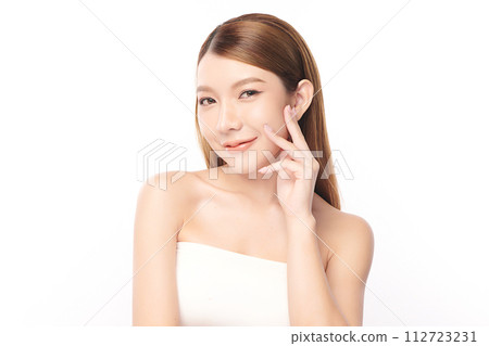 Beautiful young asian woman with clean fresh skin on white background, Face care, Facial treatment, Cosmetology, beauty and spa, Asian women portrait. Beautiful young asian woman with clean fresh skin on white background, Face care, Facial treatment, Cosmetology, beauty and spa, Asian women portrait. 112723231