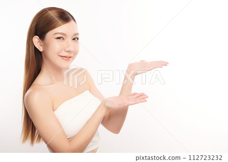 Beautiful young asian woman with clean fresh skin on white background, Face care, Facial treatment, Cosmetology, beauty and spa, Asian women portrait. 112723232