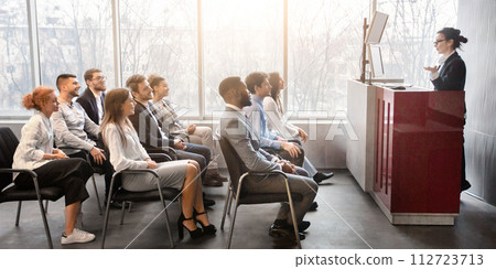Corporate training concept. Business coach giving presentation Corporate training concept. Business coach giving presentation 112723713