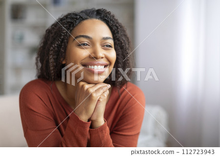 Closeup Portrait Of Beautiful Young Black Woman Posing In Home Interior 112723943