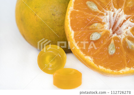 cough sore throat pastille extract orange fruits arrangement flat lay style  112726278