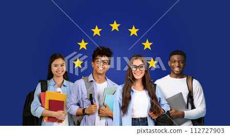 Happy international students with backpacks and notebooks standing confidently 112727903