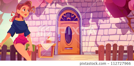 Woman on backyard with cake and coffee on table 112727966