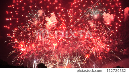 Red Firework celebrate anniversary happy new year 2024, 4th of july holiday festival. red firework in night time celebrate national holiday. Countdown to new year 2024 festival party time event Red Firework celebrate anniversary happy new year 2024, 4th of july holiday festival. red firework in night time celebrate national holiday. Countdown to new year 2024 festival party time event 112729882