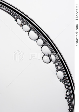A close-up photo of water droplets that can be used in science, medicine, ingredients, and beauty designs. 112729952