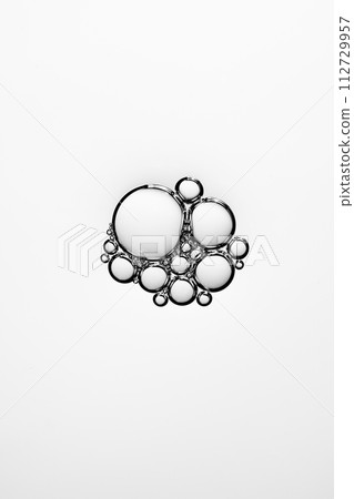 A close-up photo of water droplets that can be used in science, medicine, ingredients, and beauty designs. 112729957