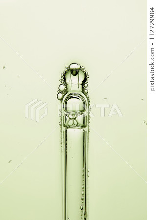 A close-up photo of water droplets that can be used in science, medicine, ingredients, and beauty designs. 112729984