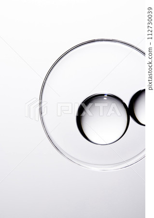 A close-up photo of water droplets that can be used in science, medicine, ingredients, and beauty designs. 112730039