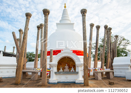 Thuparamaya stupa in ancient city of Anuradhapura, Sri Lanka. Thuparamaya is the first Buddhist temple in Sri Lanka dating back to the (247-207 BC). 112730052