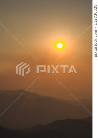 landscape and travel concept with sunset and twilight sky with layer of mountain 112730320