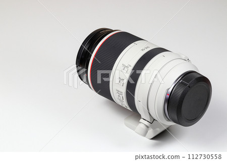 Hight performance Professional camera zoom lens isolated on white background. Hight performance Professional camera zoom lens isolated on white background. 112730558