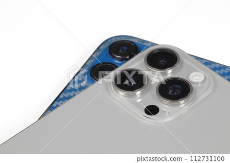 Close up of rear camera on smartphone or Mobile phone mockup on white background. Close up of rear camera on smartphone or Mobile phone mockup on white background. 112731100
