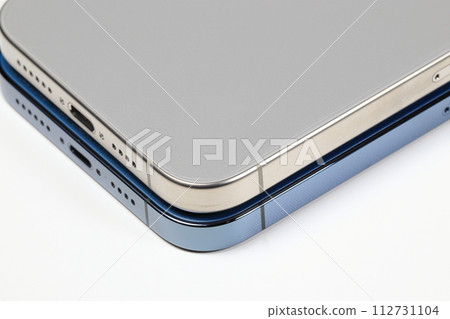 mockup smartphone or Mobile phone with triple camera on back isolated on white background. mockup smartphone or Mobile phone with triple camera on back isolated on white background. 112731104
