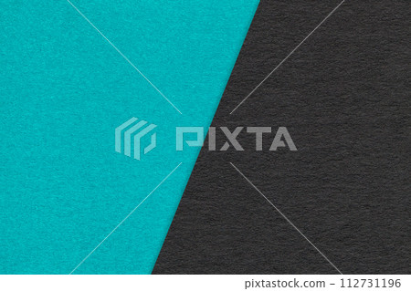 Texture of craft cerulean and black paper background, half two colors, macro. Vintage kraft blue cardboard. Texture of craft cerulean and black paper background, half two colors, macro. Vintage kraft blue cardboard. 112731196