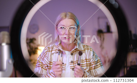 A popular woman beauty blogger is sharing secrets about cleaning facial brushes 112731304