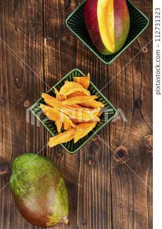 Dried and fresh mango fruit Dried and fresh mango fruit 112731323