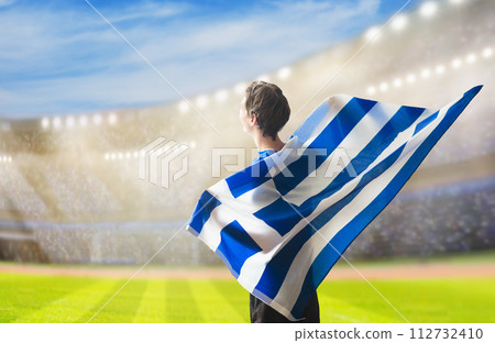 Greece football team supporter on stadium. 112732410