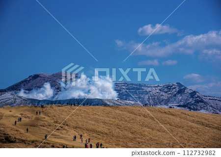 Kusasenri and Mt. Nakadake in Aso emitting smoke Kusasenri and Mt. Nakadake in Aso emitting smoke 112732982