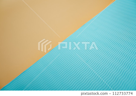 Abstract beach with paper sand and blue waves Abstract beach with paper sand and blue waves 112733774