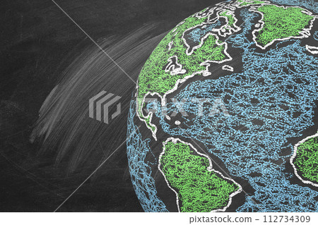 Globe on chalkboard Globe on chalkboard 112734309
