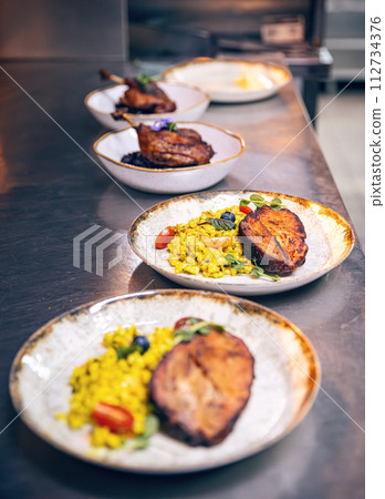 Steak with homemade gnocchi 112734376