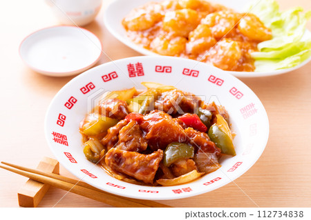 Stir-fried sweet and sour pork and shrimp with chili sauce Stir-fried sweet and sour pork and shrimp with chili sauce 112734838