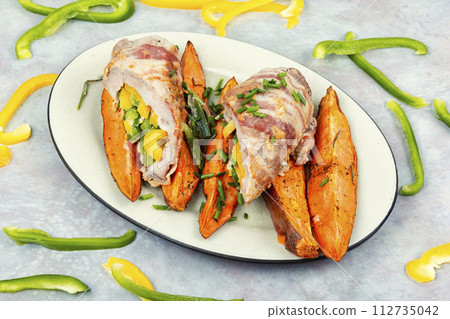 Meat roll and roasted sweet potatoes. Meat roll and roasted sweet potatoes. 112735042