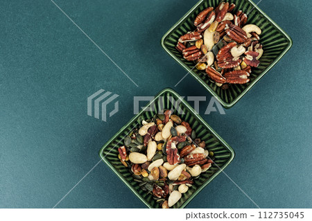Mixed nuts in a bowl Mixed nuts in a bowl 112735045