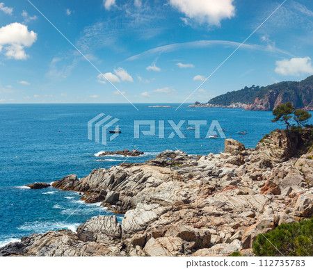 Summer sea stony coast view (Spain). Summer sea stony coast view (Spain). 112735783