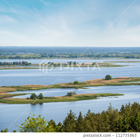 Dnipro river shores summer landscape, Kaniv water Reservoir, Kyiv Region, Ukraine. Dnipro river shores summer landscape, Kaniv water Reservoir, Kyiv Region, Ukraine. 112735863