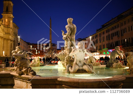 Fountain of the Moor in Piazza Navona city square at night Fountain of the Moor in Piazza Navona city square at night 112736089